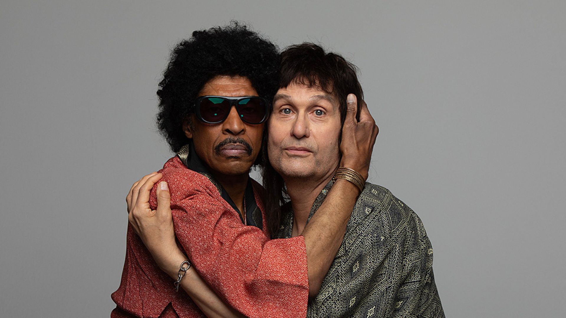 Photo of Ebony and Ivory holding each other