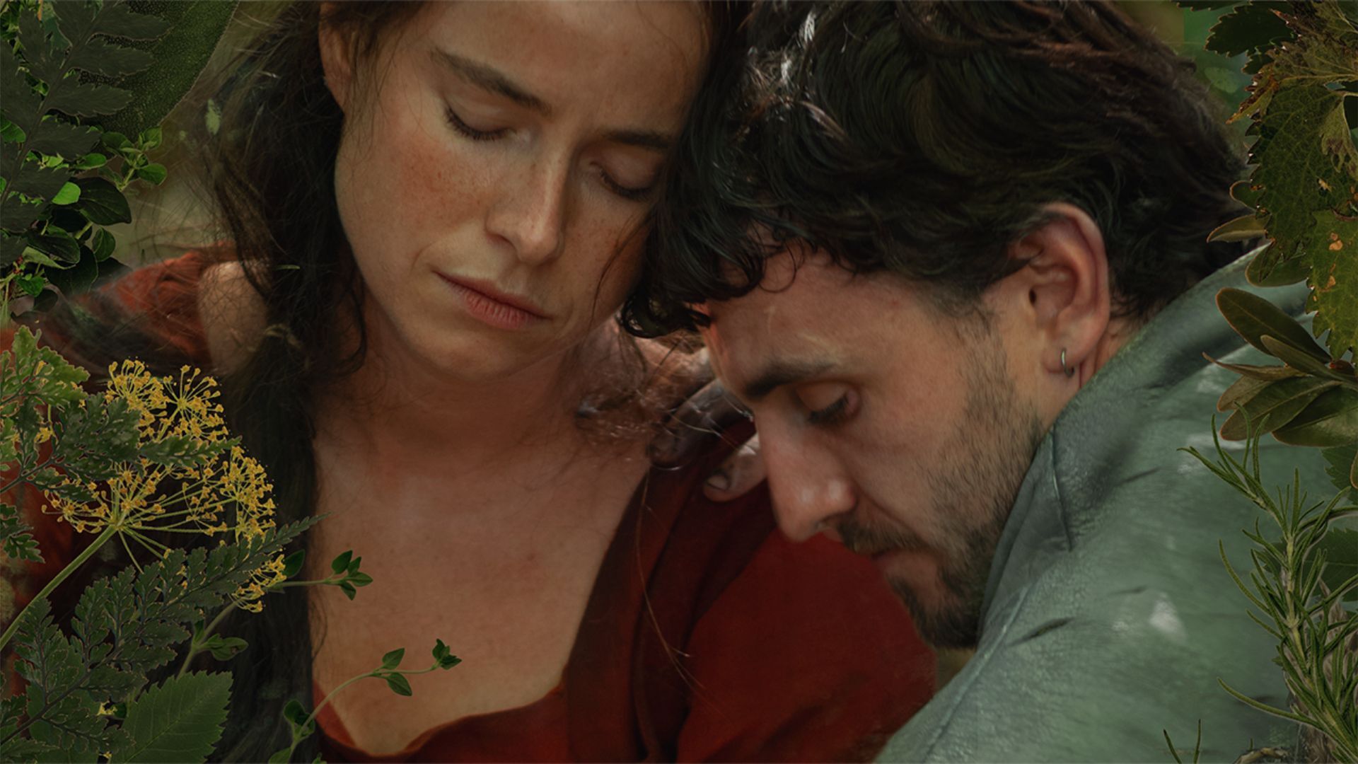 Romantic image of man and woman leaning their heads on each other