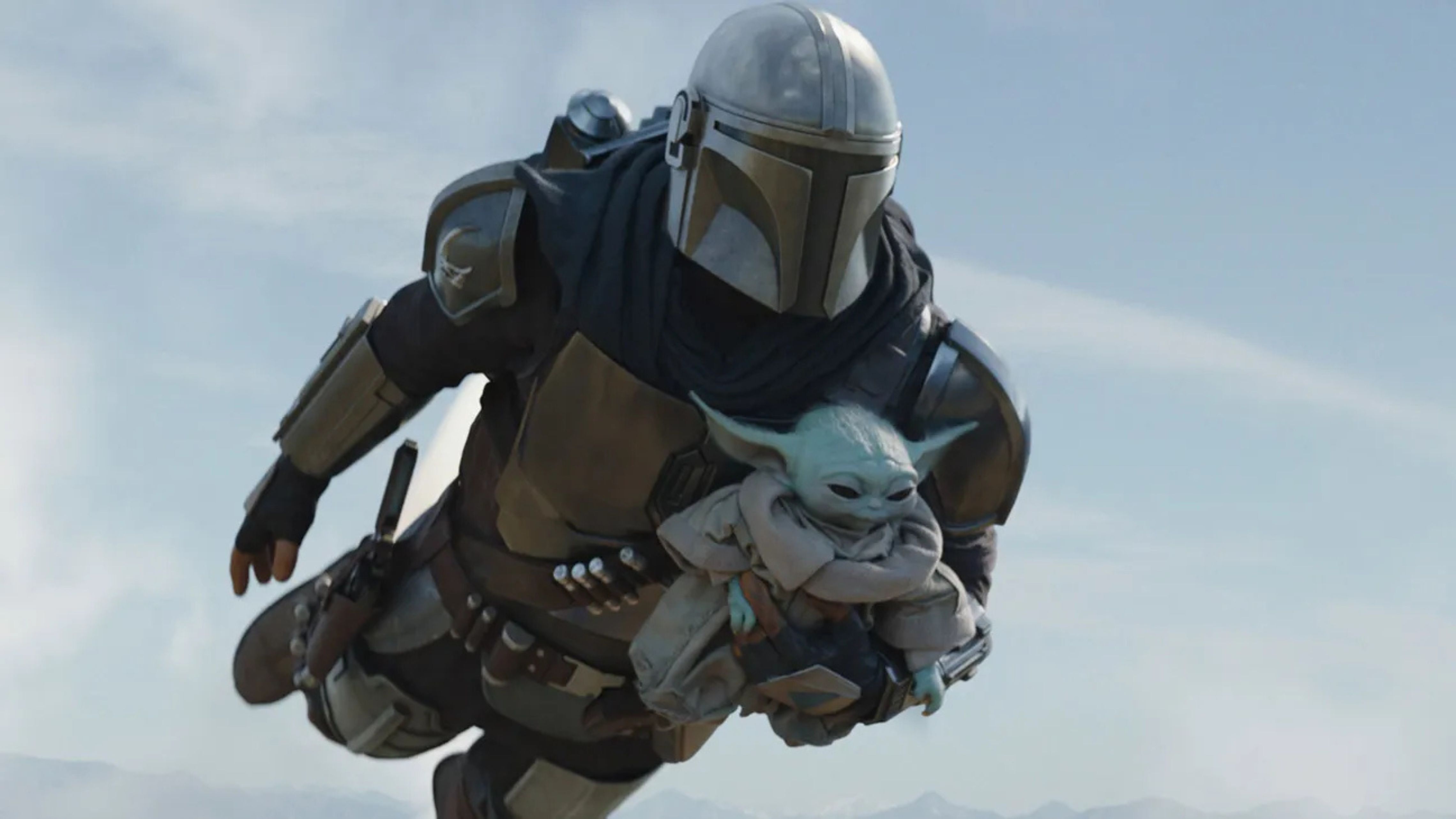 Mandalorian and Grogu flying through the air