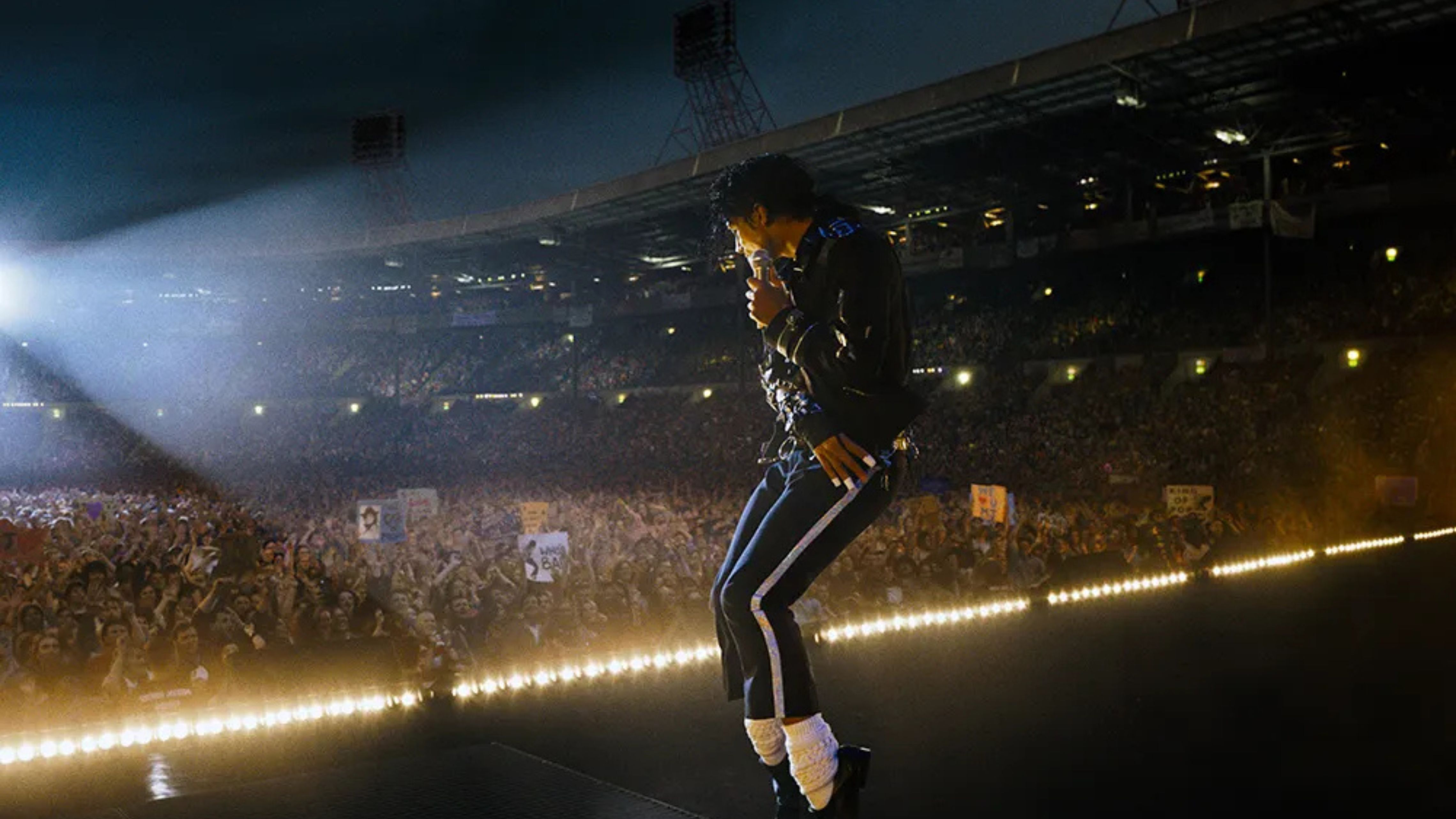 Actor playing Michael Jackson performing to a huge crowd
