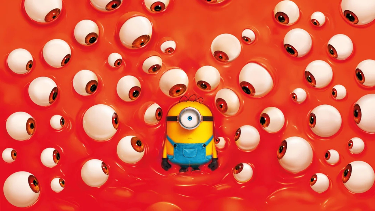 Minion with an orange monster who has lots of eyes