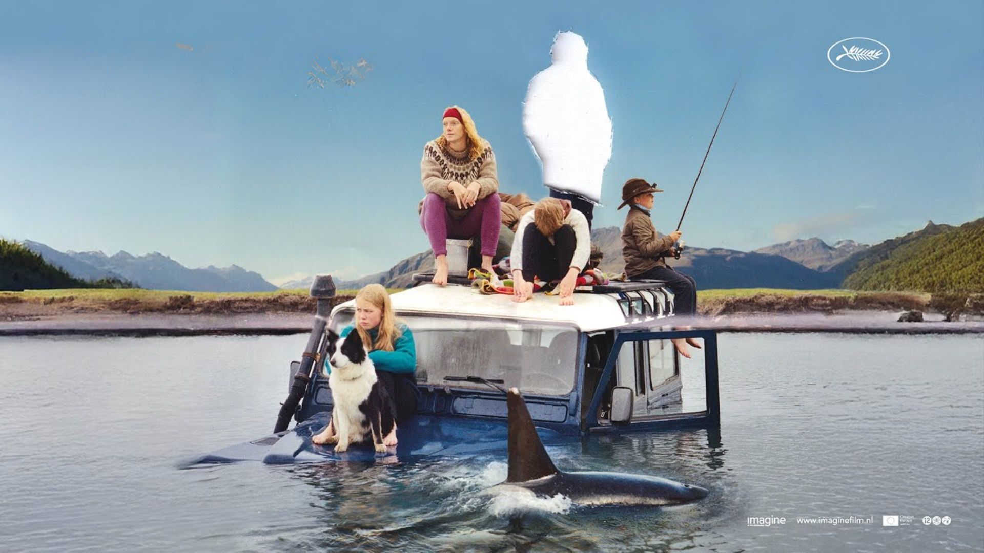 Landover submerged in water with family and dog sitting on top of it