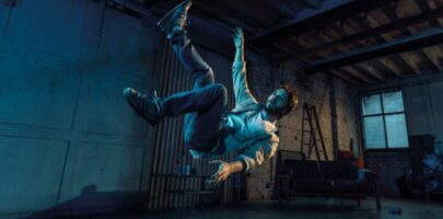 Man falling through the air in a shed