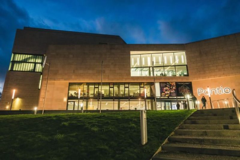 Front of Pontio building at night