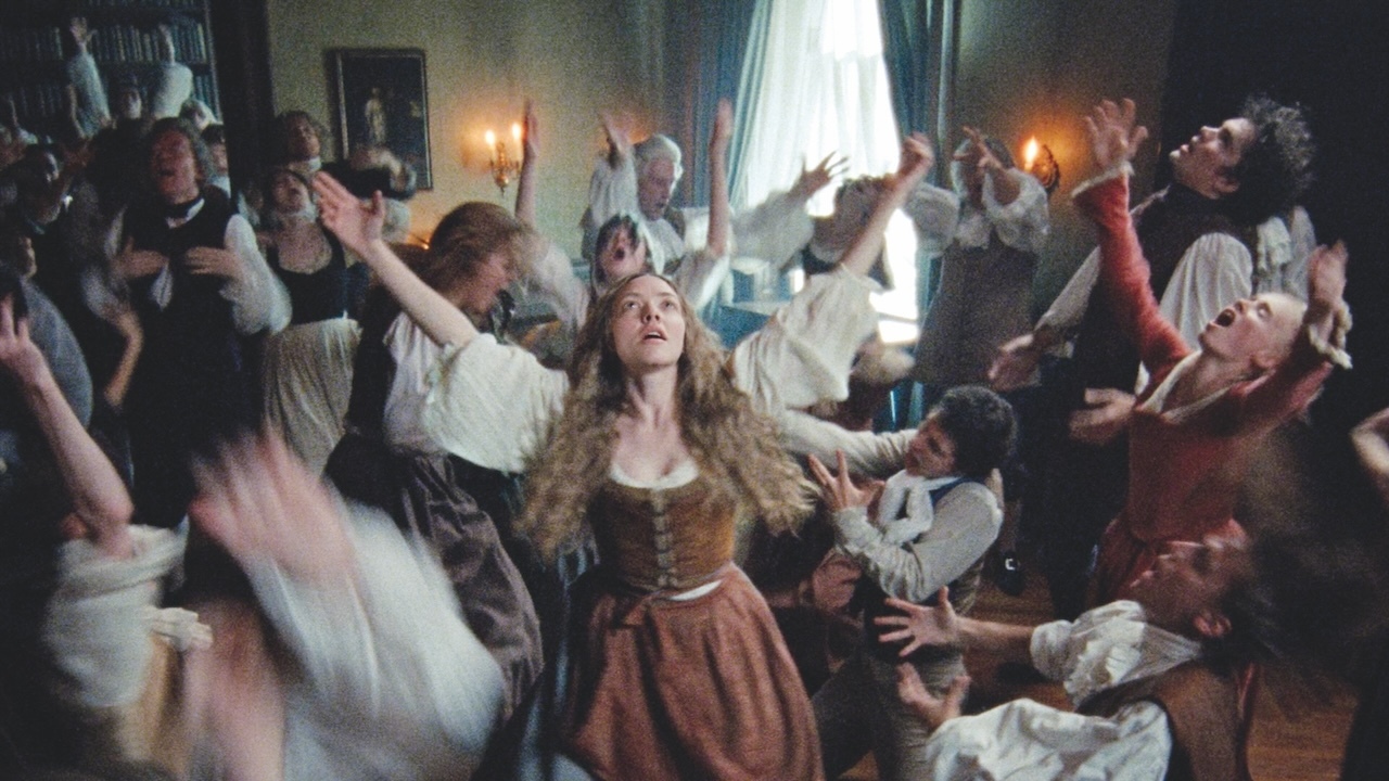 A room full of people dancing - film set in the 18th century
